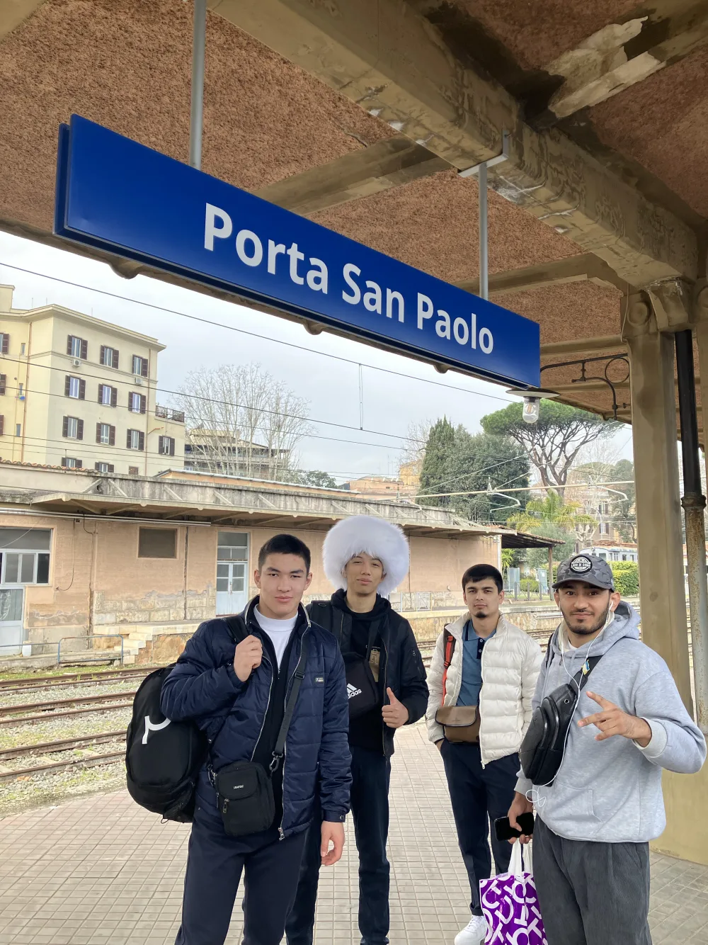 Kaizen team traveling to compete in Rome, at Porta San Paolo station